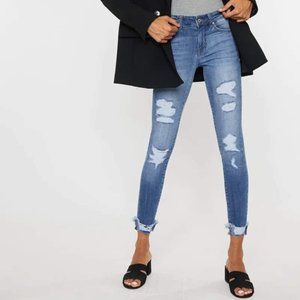 KanCan jeans. Mid Rise Skinny Distressed. Sizes 3/25, 5/26, 13/30, and 15/31